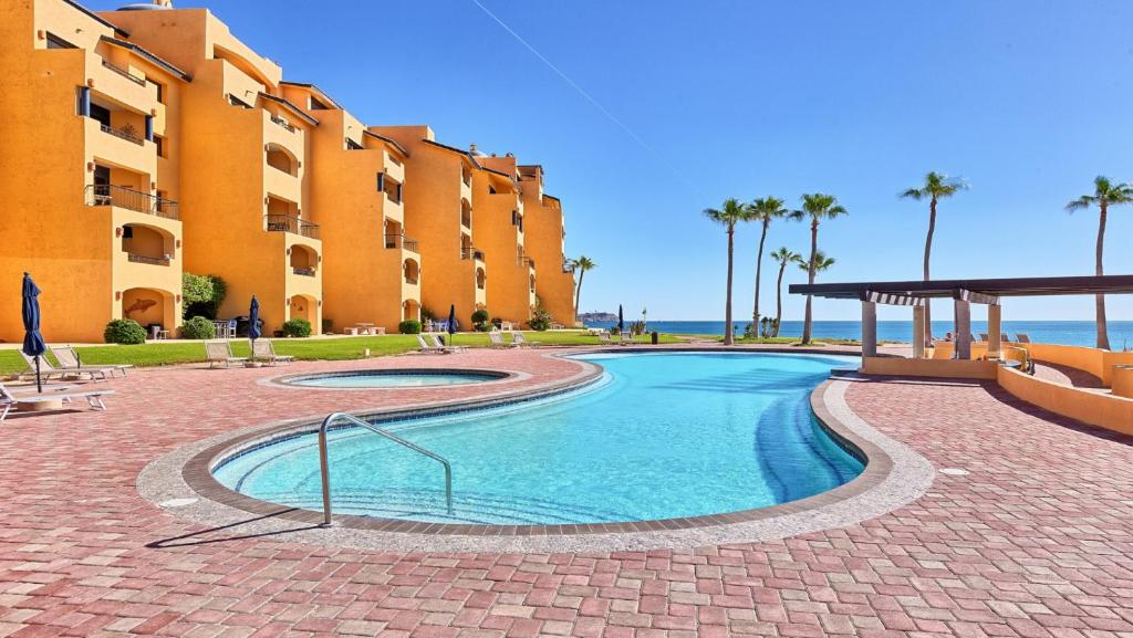Ground Floor 1BR Beachfront - Steps to Pool - Princesa E104 - BeachBumCondos photo 3