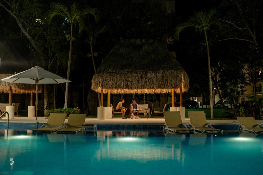 Custom decor-sleeps 6 with 2 pools- Condo near beach-Puerto Morelos Mexico photo 3