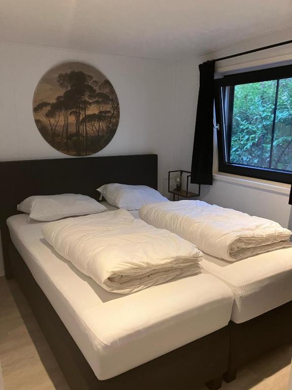 Schitterend 6 persoons chalet met HOTTUB aan de bossen van Putten photo 2