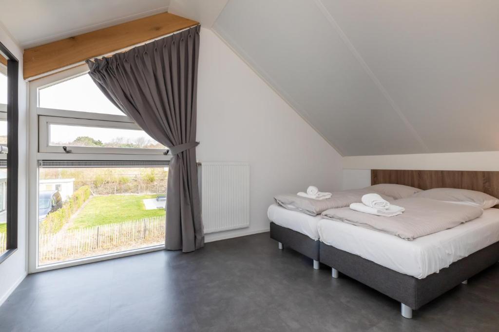 Welcome in - Strandvilla's dichtbij het strand - Vakantiepark Zonnedorp Renesse photo 2