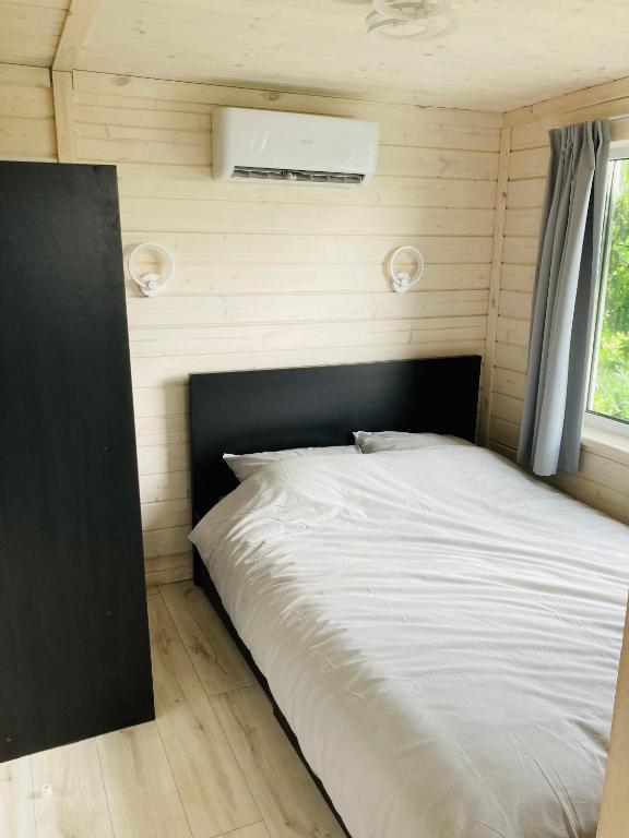 Tiny house aan het water op de appelhof photo 2