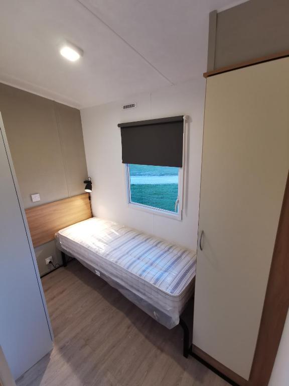 Stacaravan op 5 Sterren Vakantiepark De Kuilart Friesland aan het Meer met Zwembad 5P 116 photo 2