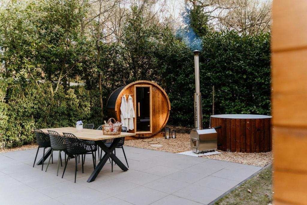 Romantisch Wellness Boshuisje met Sauna & Hottub — photo 1