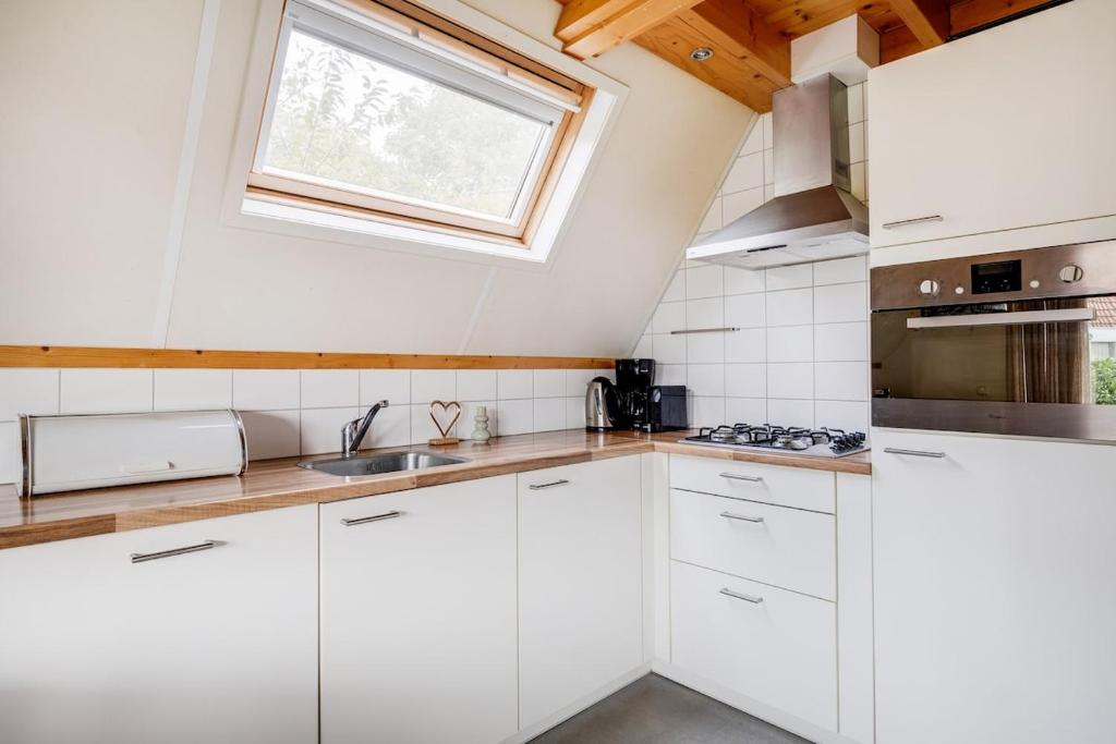 Tjiftjaf I Huisje met Uitzicht op Ruime Tuin photo 3
