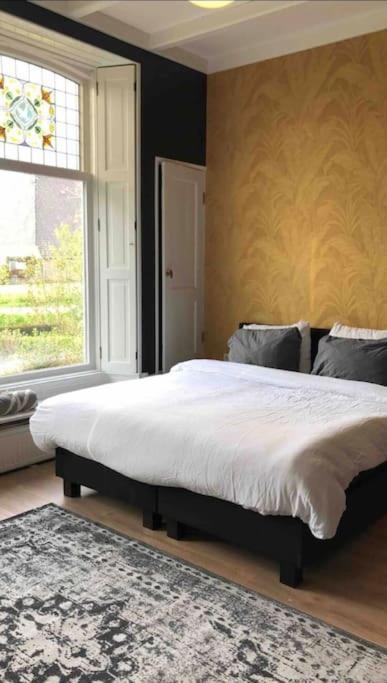 Statige boerderijwoning met vrij uitzicht en tuin photo 2