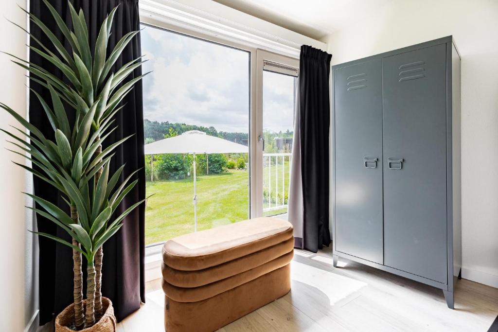 Tiny house XL - Vakantiepark De Kremmer photo 2