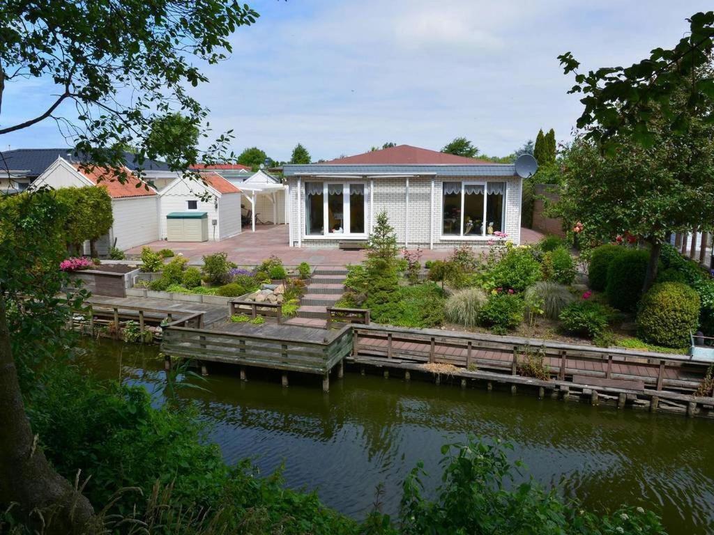 Bungalow in Makkum near Lake Beach — photo 1