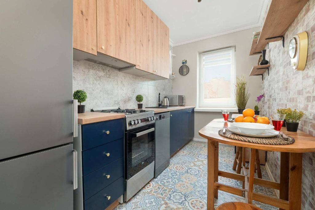 Wyjątkowy Apartament w Stylu Vintage z Balkonem by Noclegi Renters photo 3
