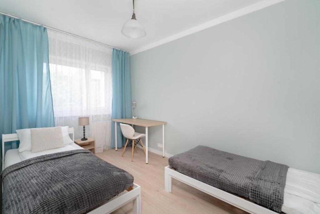 Bukowska Elegancki Apartament z 1 Sypialnią i Biurkiem by Noclegi Renters photo 3