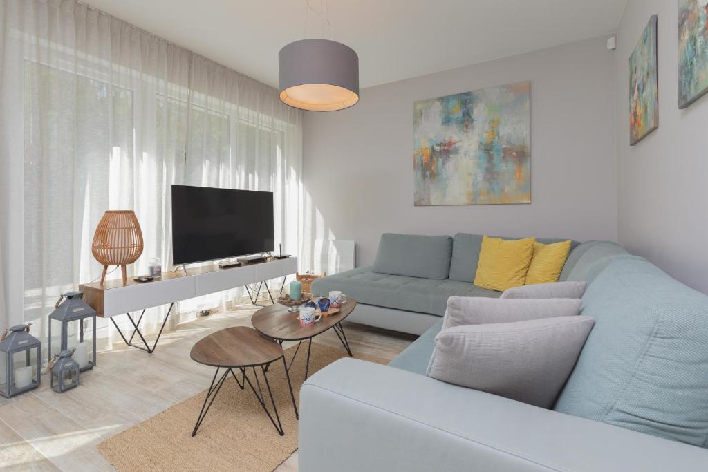Sunny Apartment Łukęcin by Noclegi Renters — photo 1