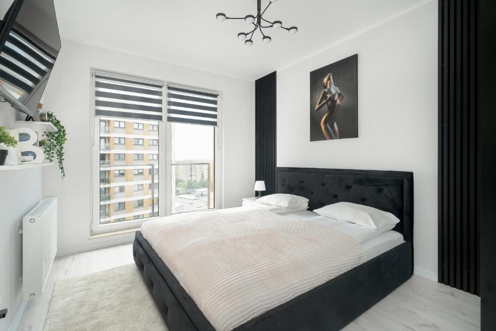 Wyjątkowy i Nowoczesny Apartament z Balkonem i Parkingiem by Noclegi Renters photo 2