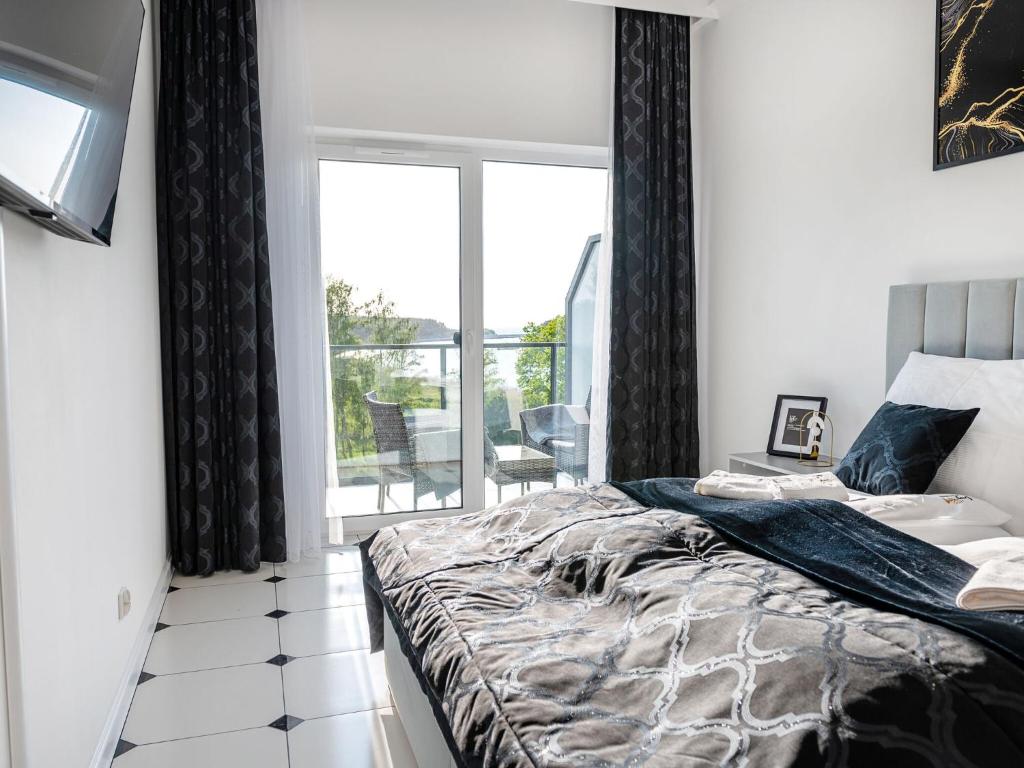 Apartment by Dziwna River with Pool Access photo 2