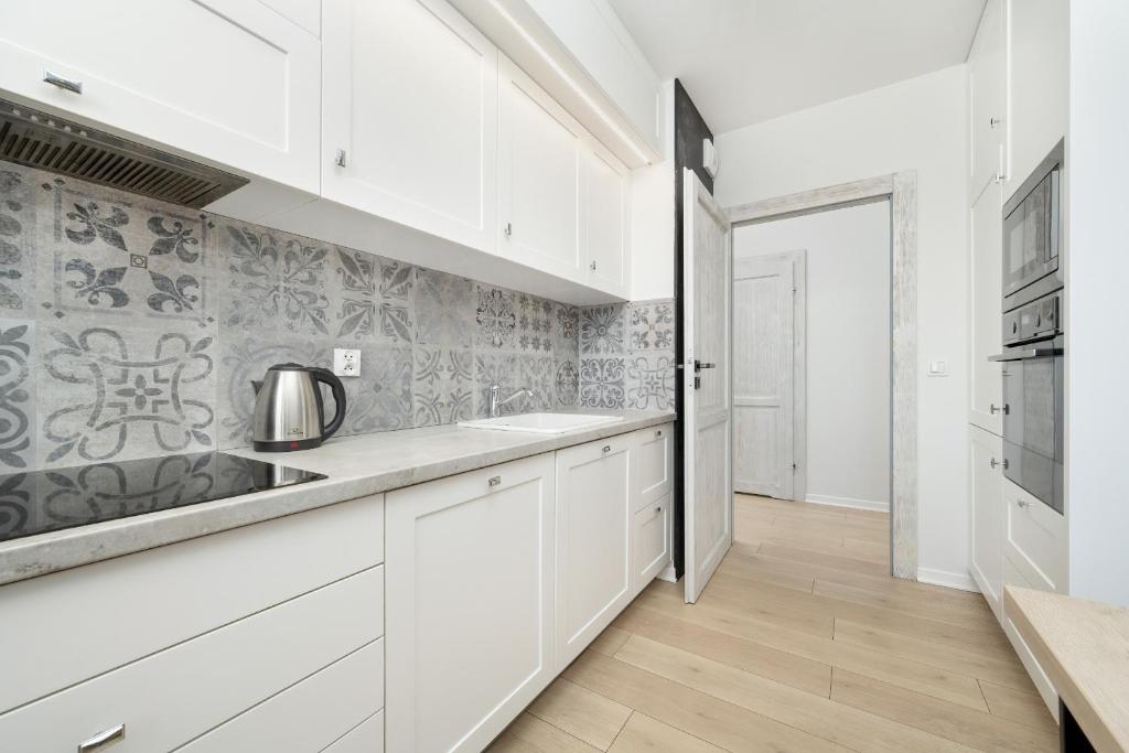 Wyjątkowy Apartament z Parkingiem dla 6 osób by Noclegi Renters photo 3
