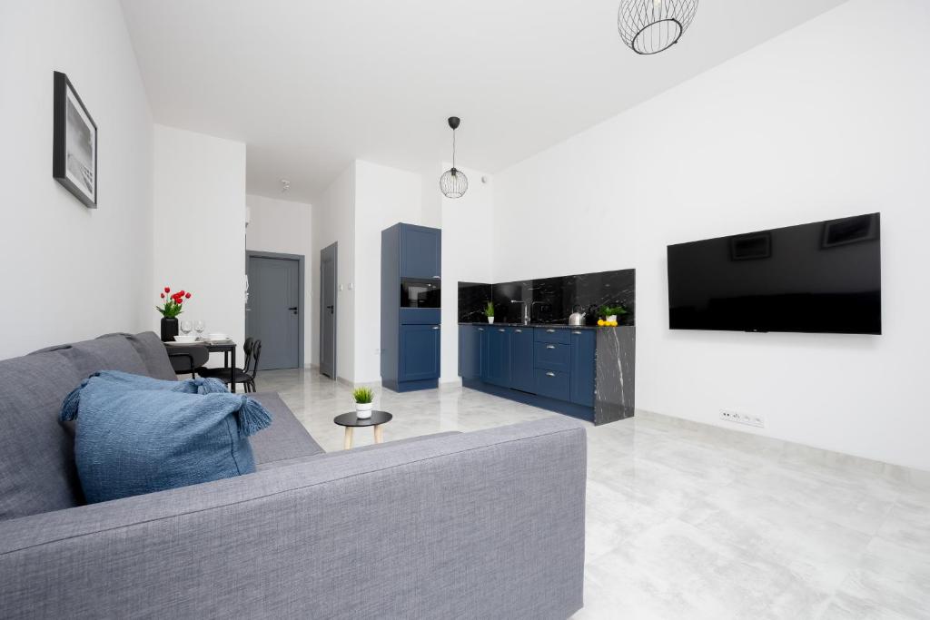 Wyjątkowy Apartament z Uroczym Ogródkiem oraz Parkingiem by Noclegi Renters photo 2