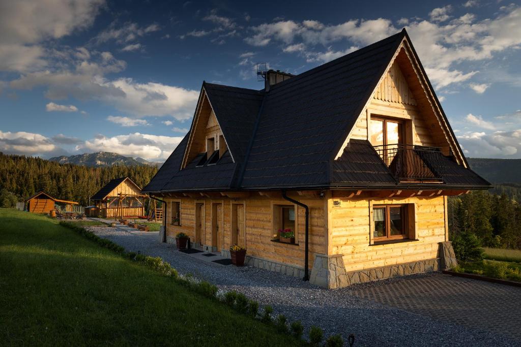 Witowiańskie Domki z prywatnym jacuzzi i kominkiem — photo 1