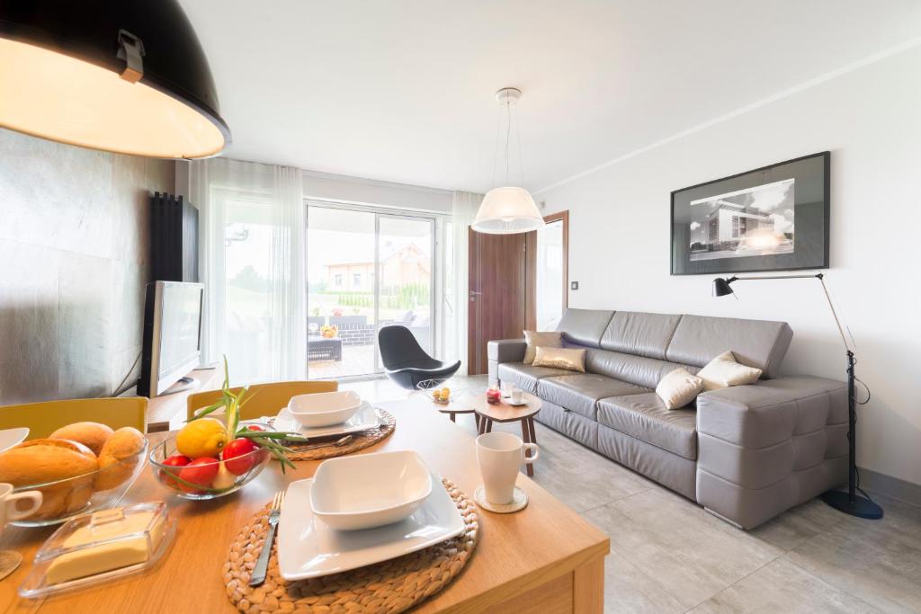 Apartament Kalinowo Golf - salon z opcją spania — photo 1