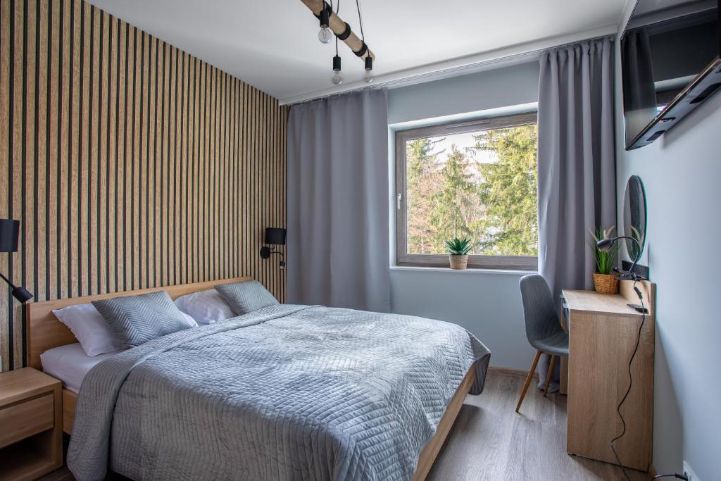 Stone Hill Apartament Wellness z basenem jakuzi saunami prywatnym garażem i rowerami w cenie photo 2