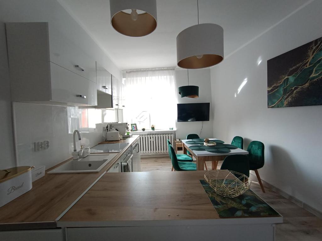 Szmaragdowy apartament przy ulicy Opolskiej — photo 1
