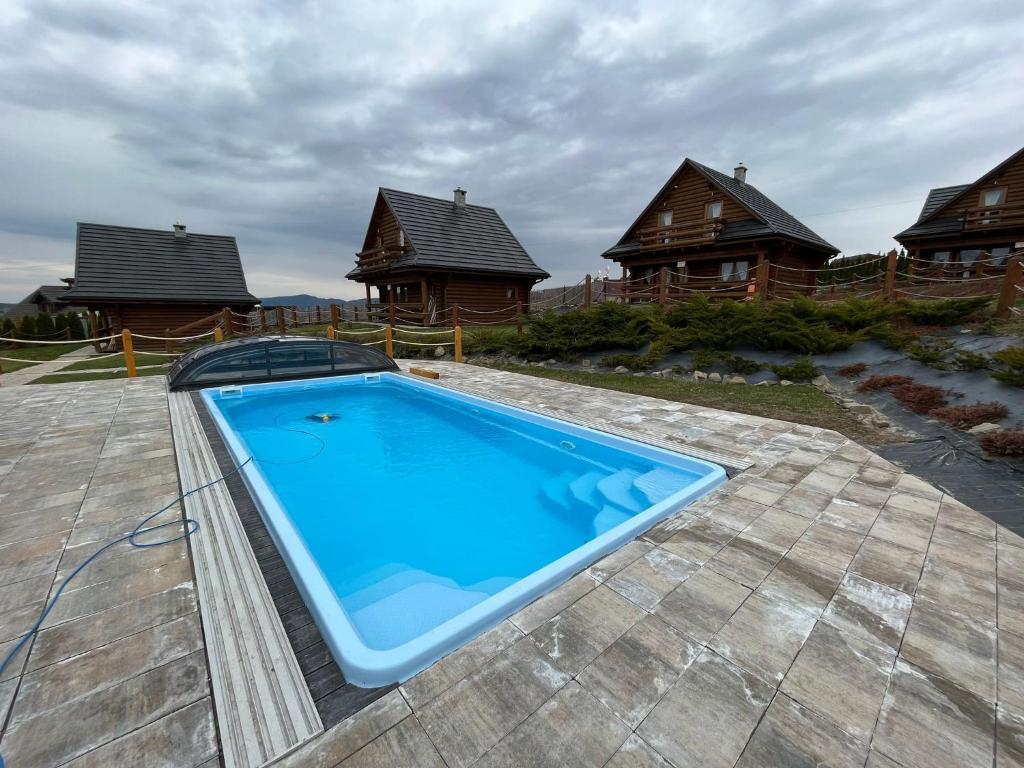 Domki Zagroda Domek z bala z basenem & sauna & balia z hydromasażem photo 3