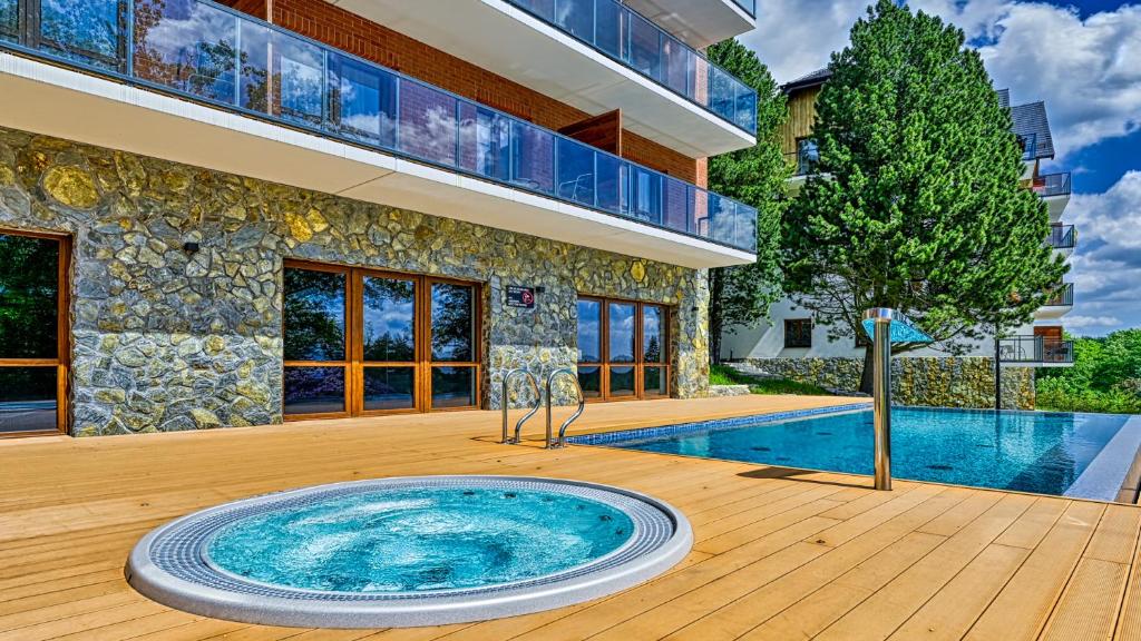 ROYAL APARTS Green Park Resort VIP z basenami — photo 1