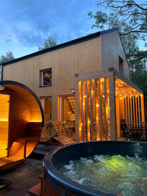 Sauna&Jacuzzi Domki Pod Brzozami Sława — photo 1