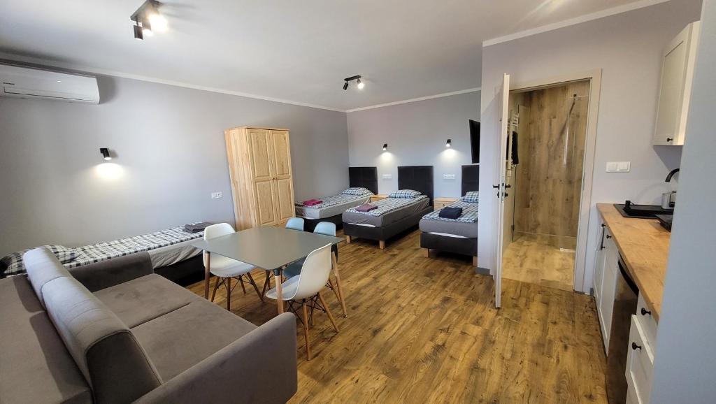 Wrzosowe Wzgórze 5 - Studia i Apartamenty — photo 1