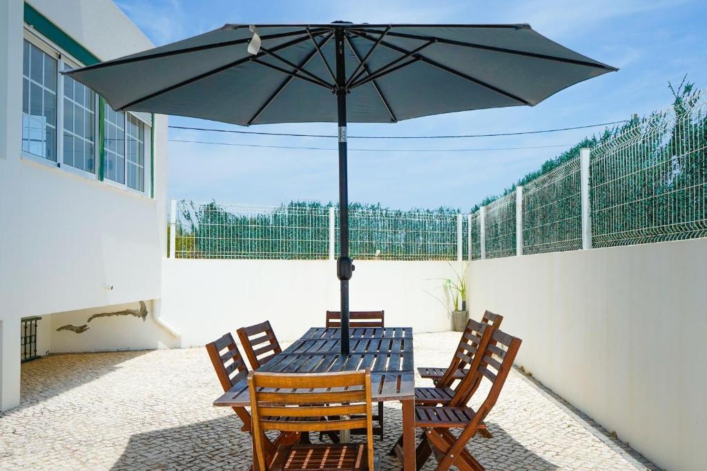 Serene Duplex House With Patio by LovelyStay photo 2
