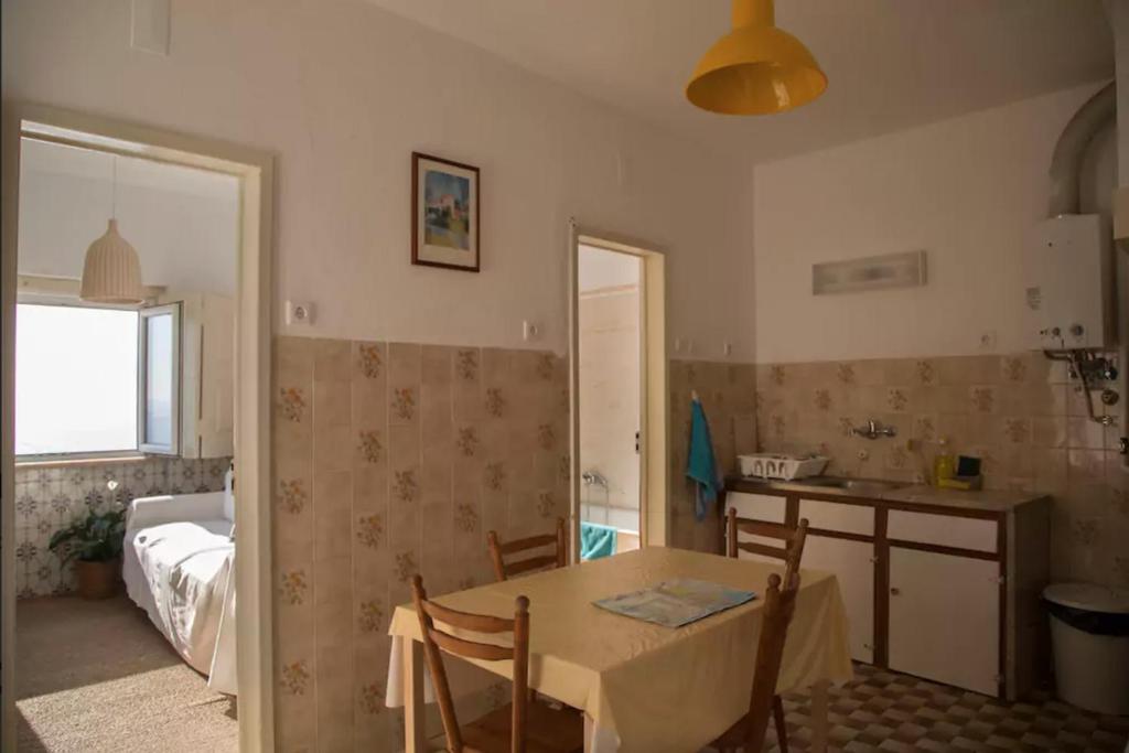 Seafront house above the beach M113 photo 3