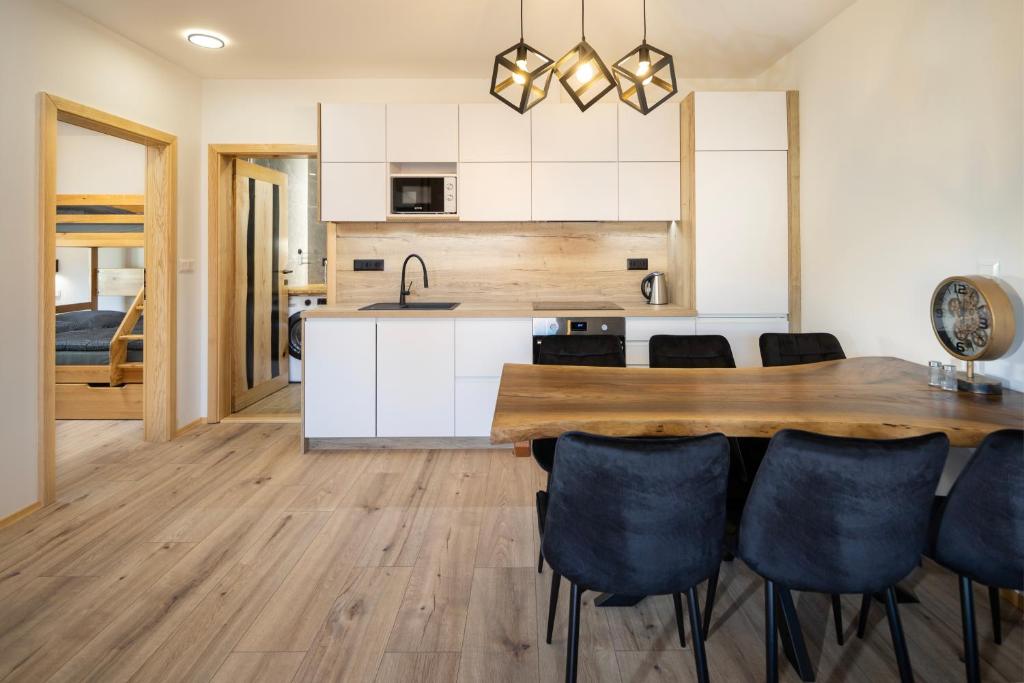 WOODY Apartman — photo 1