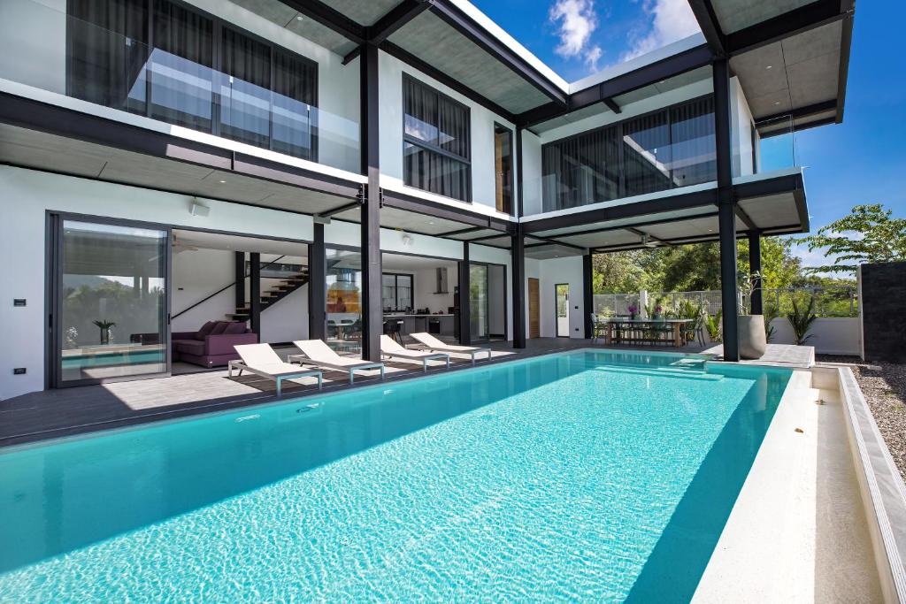 Loft-Style Hyper Modern 4Br Villa Sunset garden 6 with 12x5m Salt Pool — photo 1