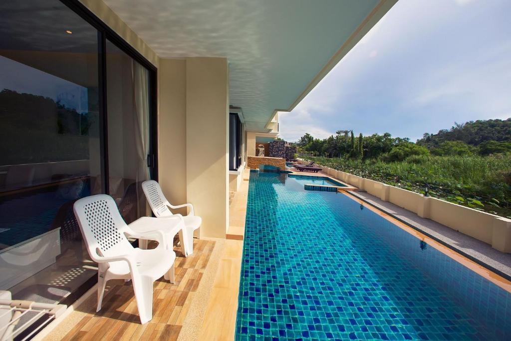 LAGO APARTMENTS BY TROPICLOOK photo 3