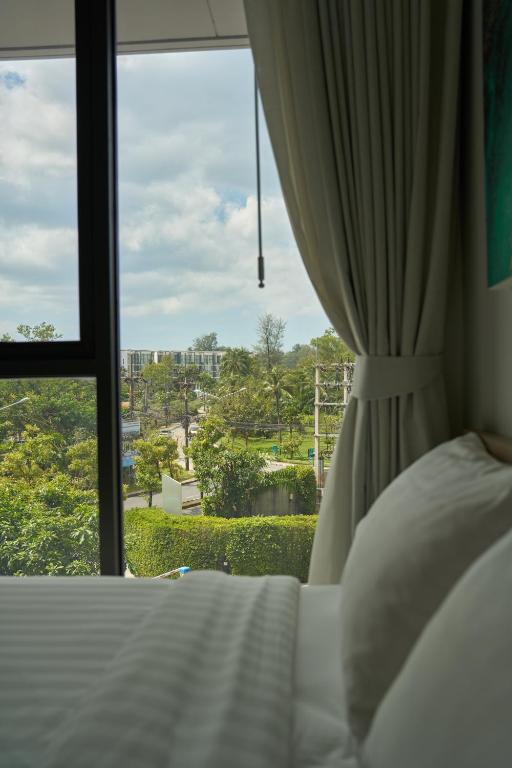 Modern 2-bedroom Apartments with washer in Skypark Laguna Bang Tao photo 2