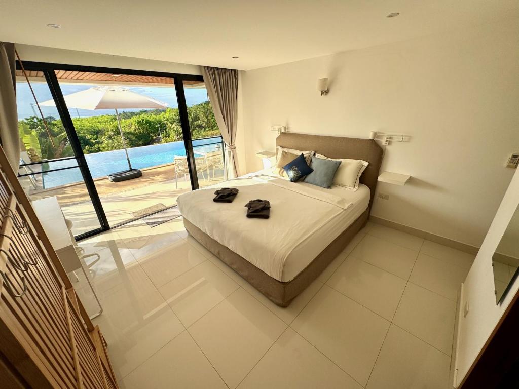 The Carma - stylish and luxury sea view pool villa photo 2