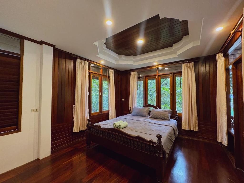 Wooden house with shared pool photo 2