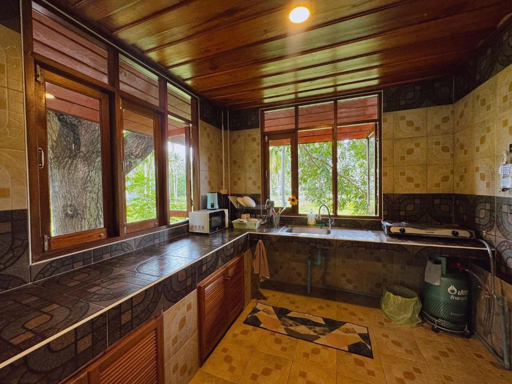 Wooden house with shared pool photo 3
