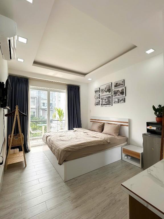 Cozy Saigon Sunset Apartment - Steps to Bui Vien Nightlife — photo 1